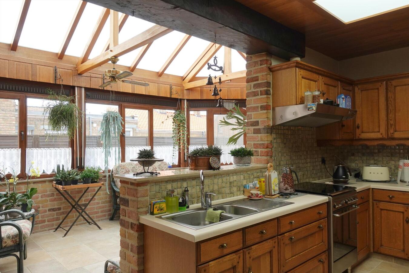 Uitzonderlijke woonst met werkplaats 