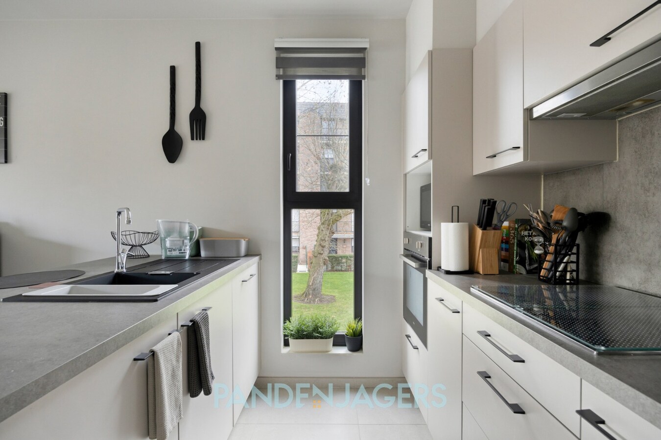 Instapklaar appartement met groot terras en ondergrondse parking in Willebroek 