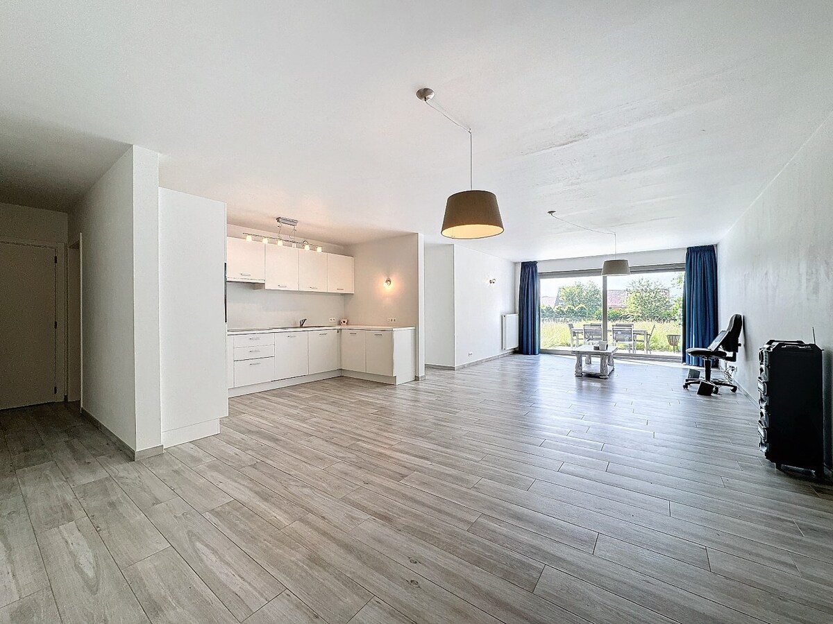 Recent (2017) gelijkvloers appartement met grote tuin te Ophasselt 
