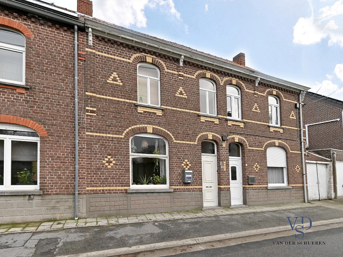 Gezellige rijwoning met tuin. 