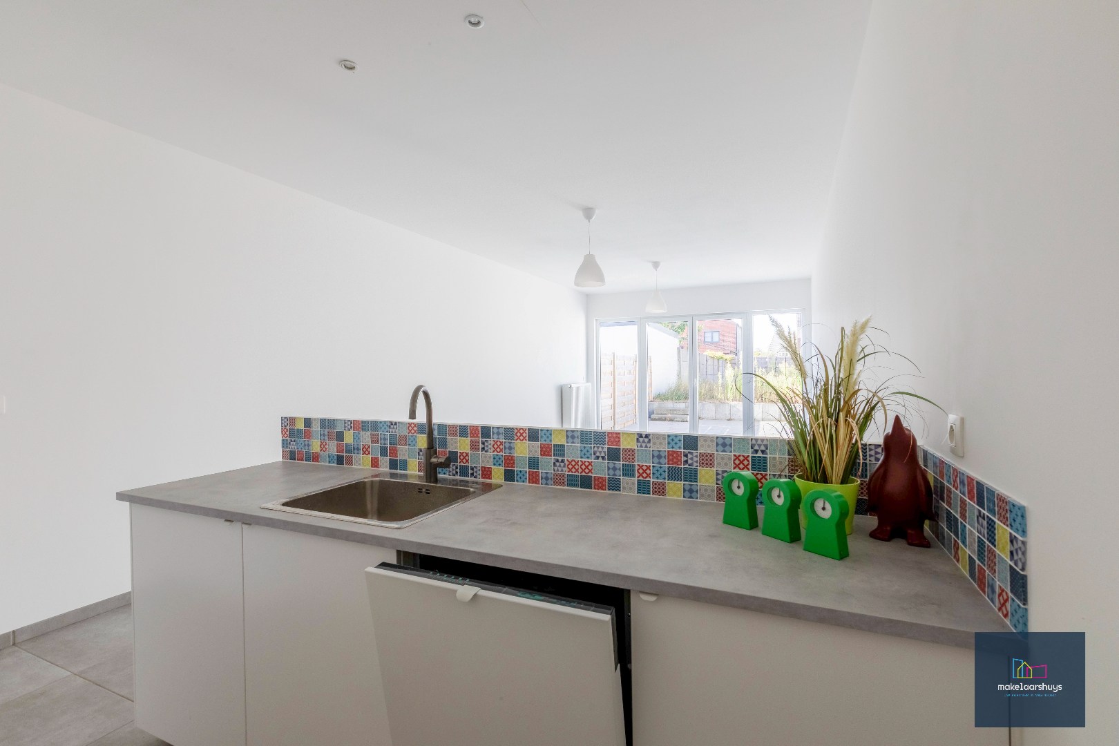 Instapklare energiezuinige woning met 3slpk tuin en staanplaats 