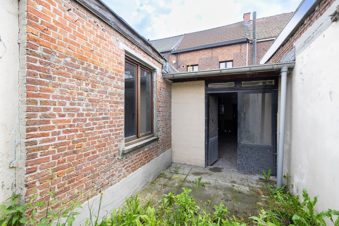 Woning met 3 slpks en stadskoer 