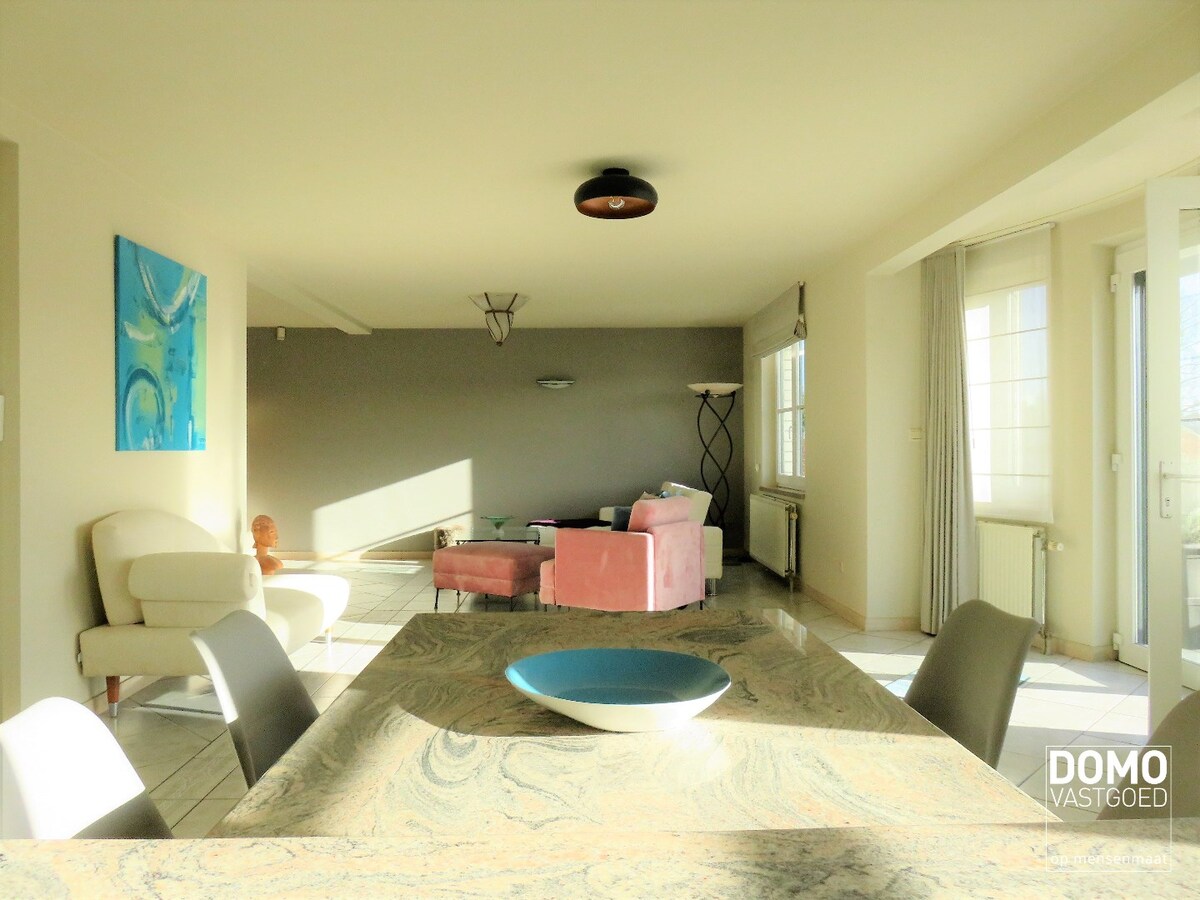 GUNSTIG GELEGEN OPBRENGSTEIGENDOM TE HASSELT 