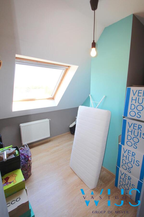 Gezellige 2 slaapkamerduplex mét garage 