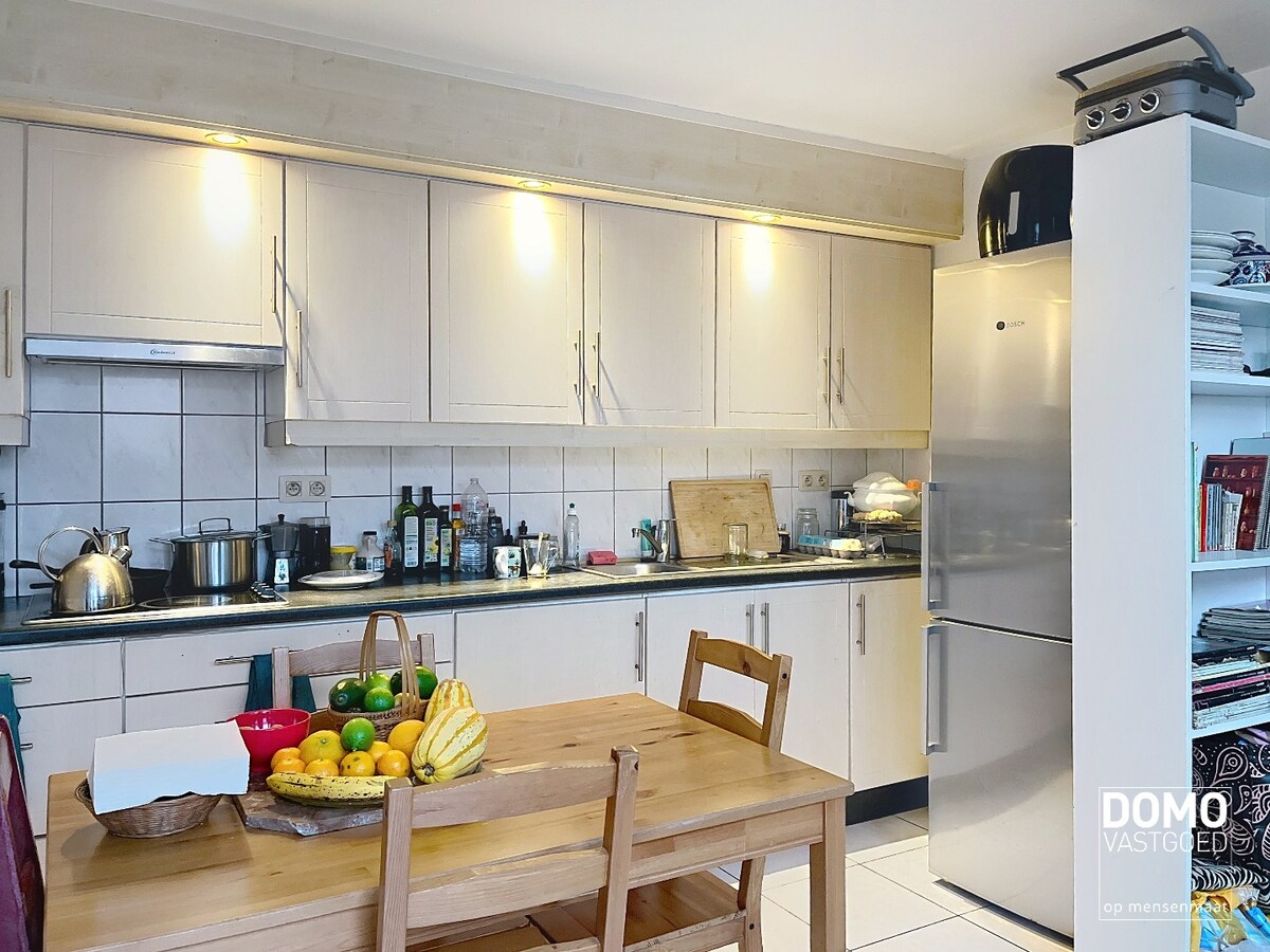 Halfopen bebouwing met tuin te Herk-de-Stad 