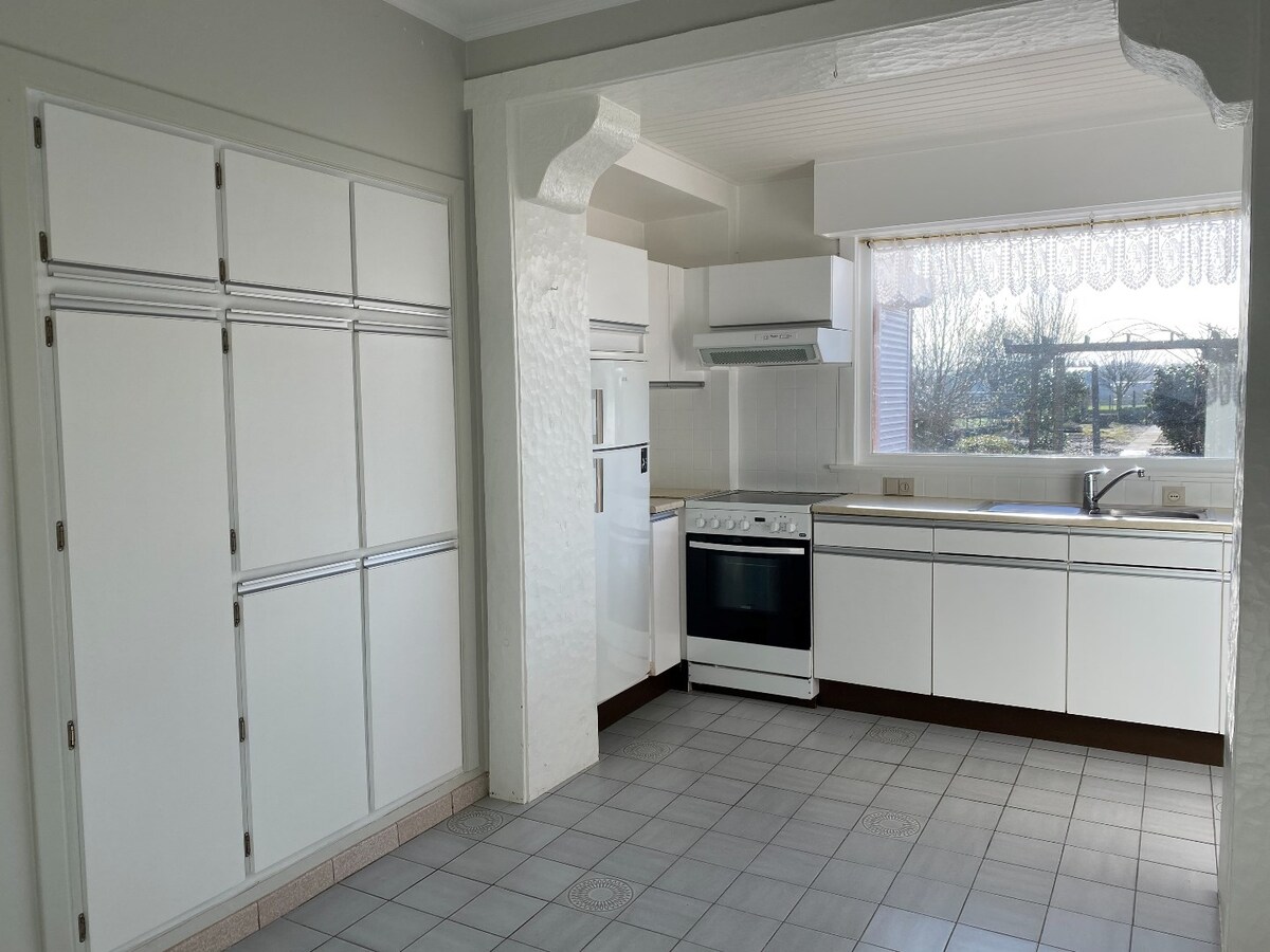 Ruime halfopen woning met garage, 3 slaapkamers en tuin 