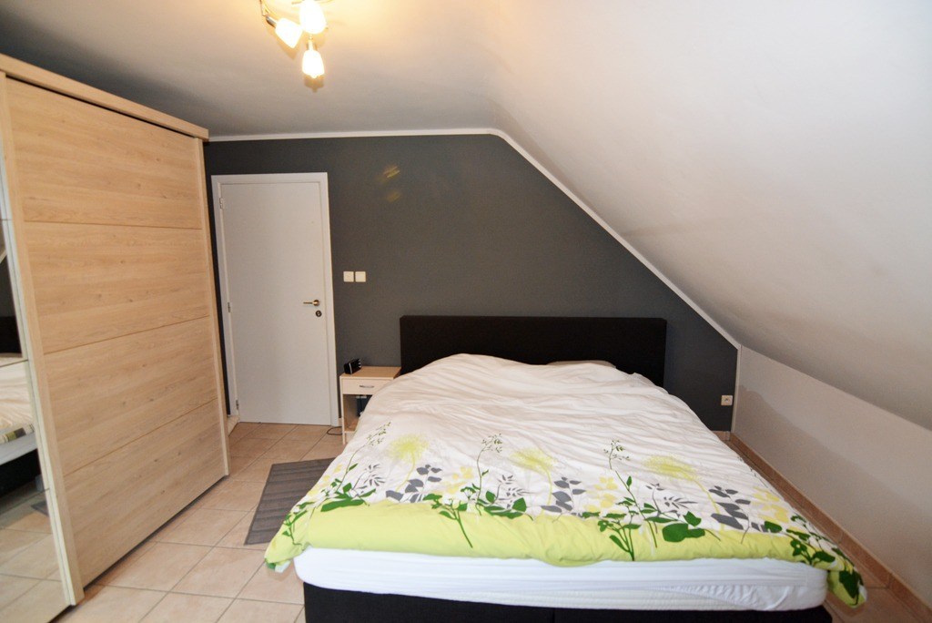 Energiezuinig appartement met 2 slpks, terras en inpandige garage. 