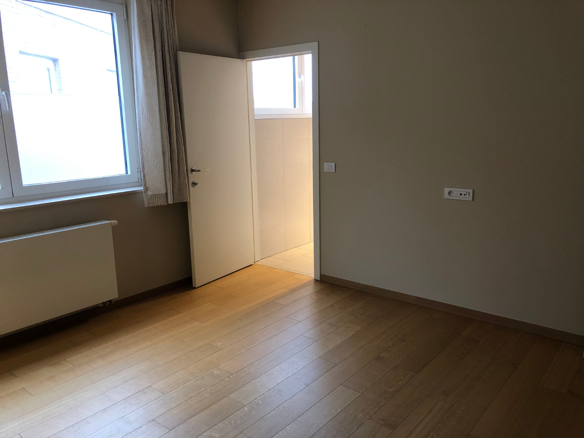 Bijzonder ruim 2-slpk-luxeappartement in centrum De Pinte 