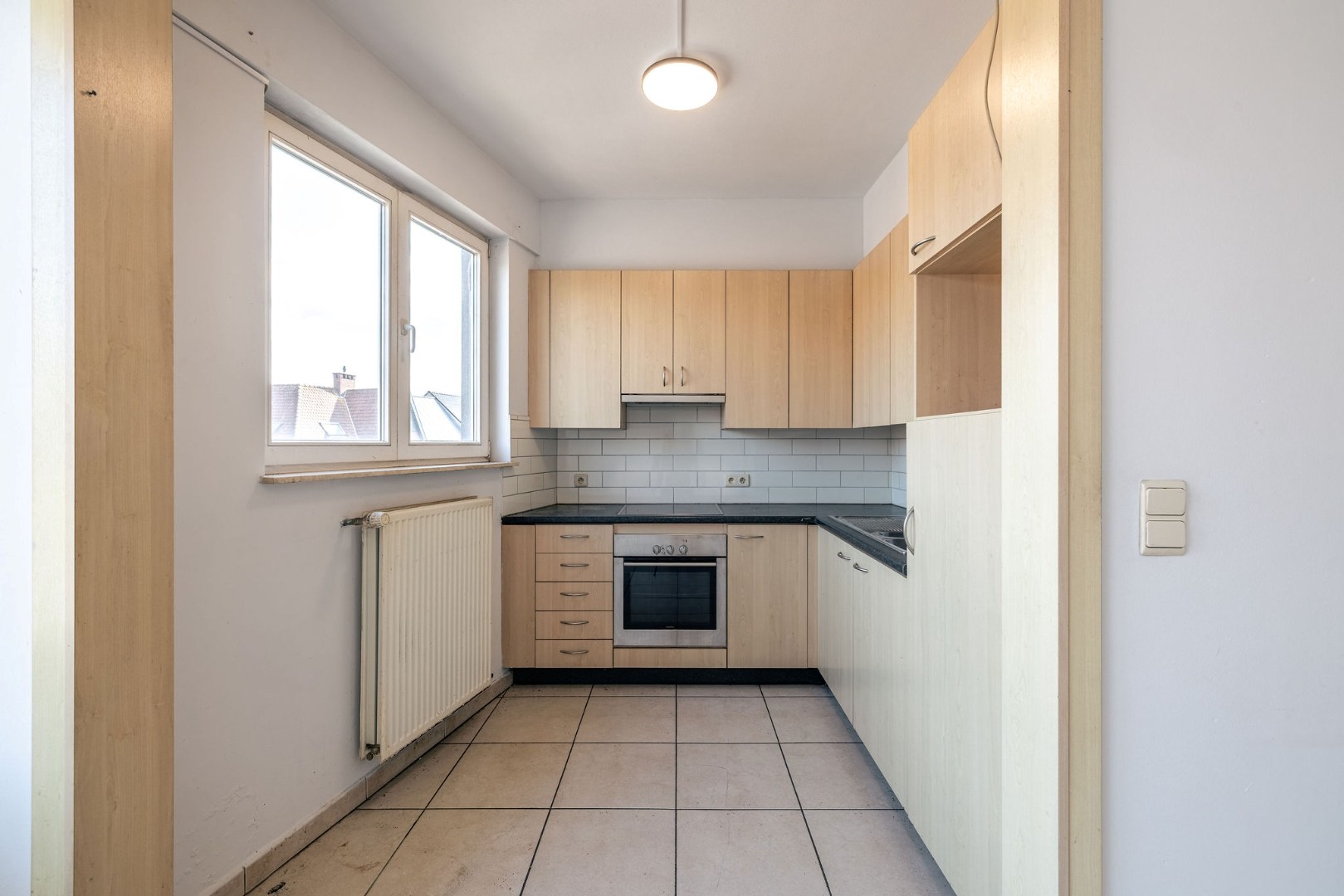 Lichtrijk en instapklaar wonen op de eerste verdieping nabij Gent 