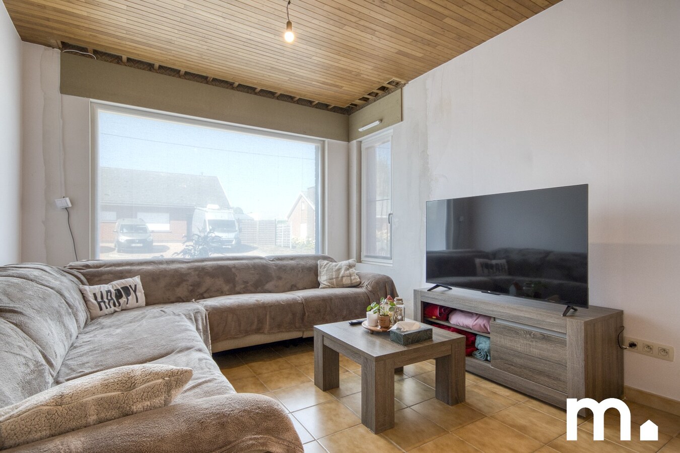 Half open gezinswoning met ruime tuin en garage te koop ! 