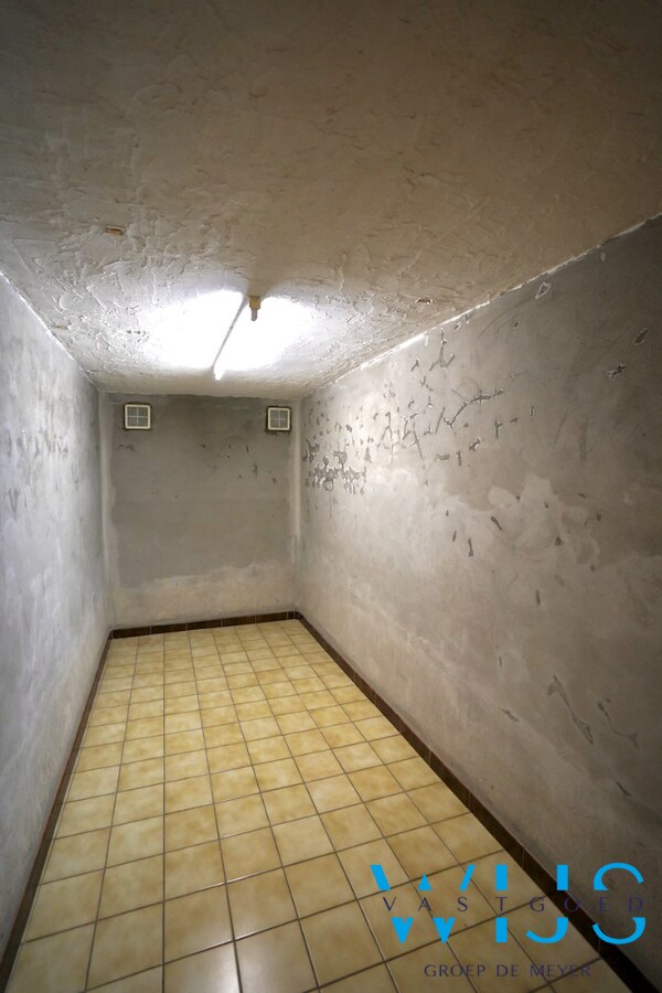 Fantastische open bebouwing met dubbele garage in gegeerde woonwijk te Evergem 