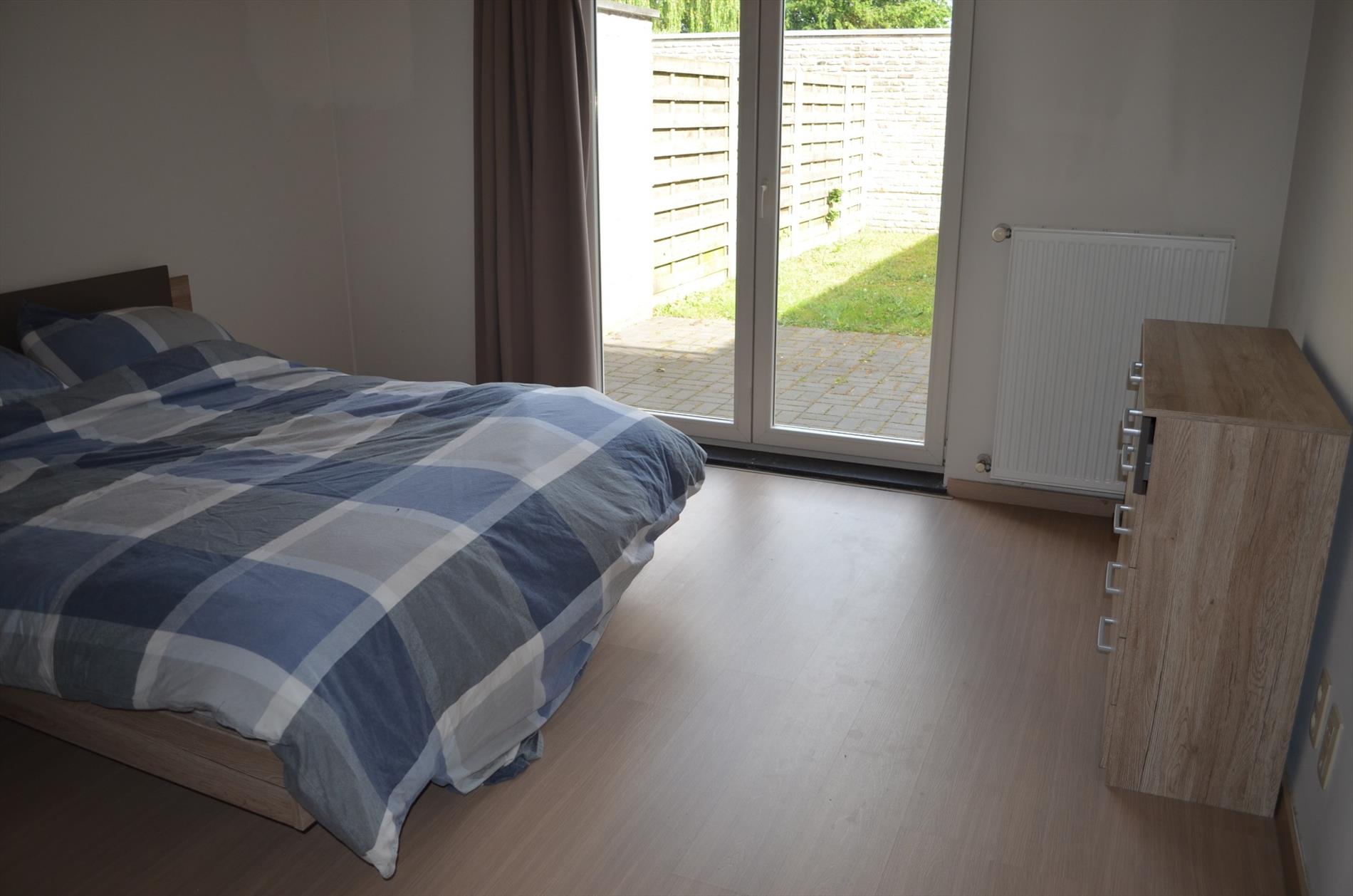 Gelijkvloers appartement met 2 slpks, terras, tuin en garage te Maldegem 