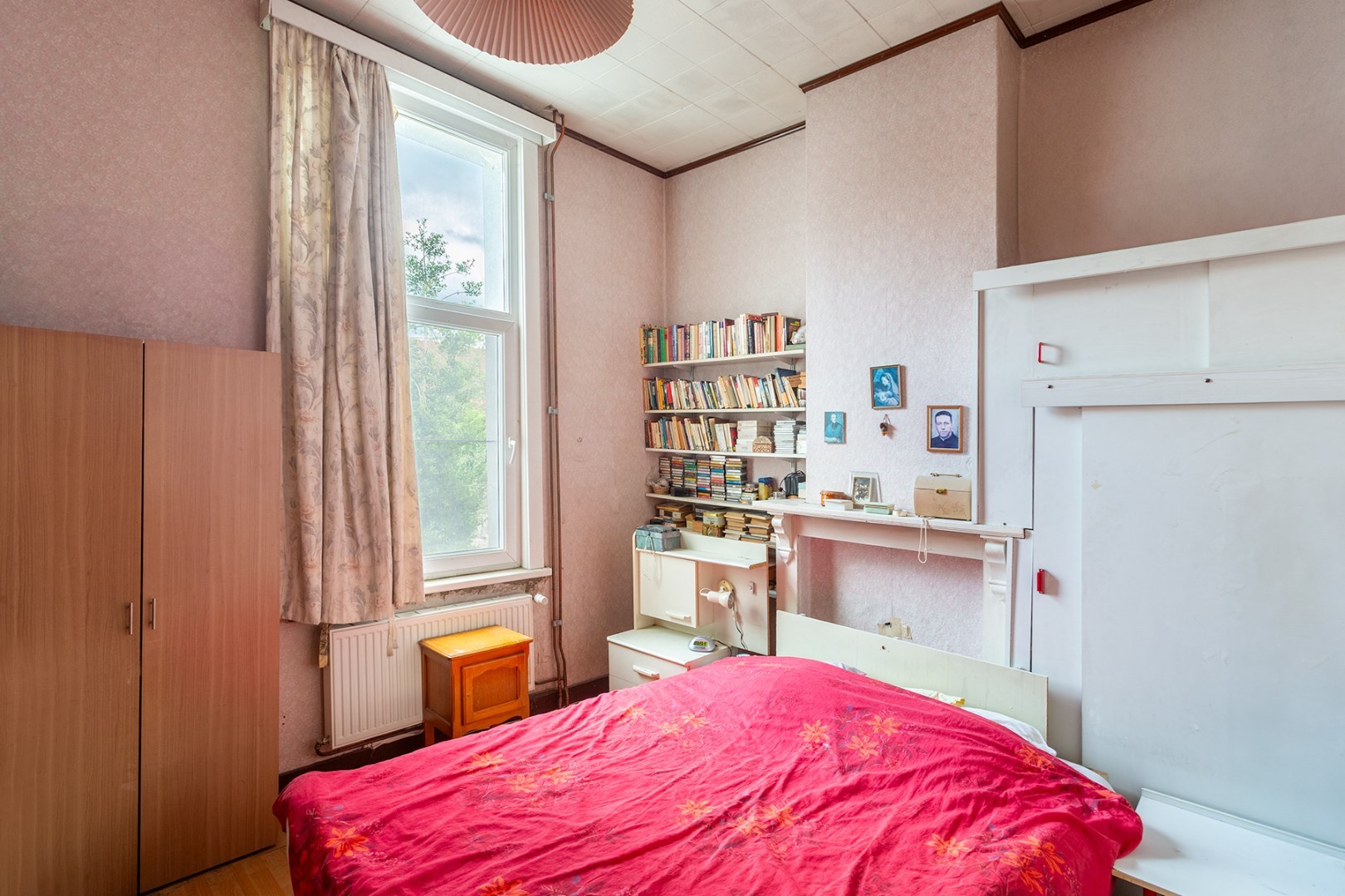 Unieke renovatiewoning met karakter en potentieel in hartje Ledeberg 