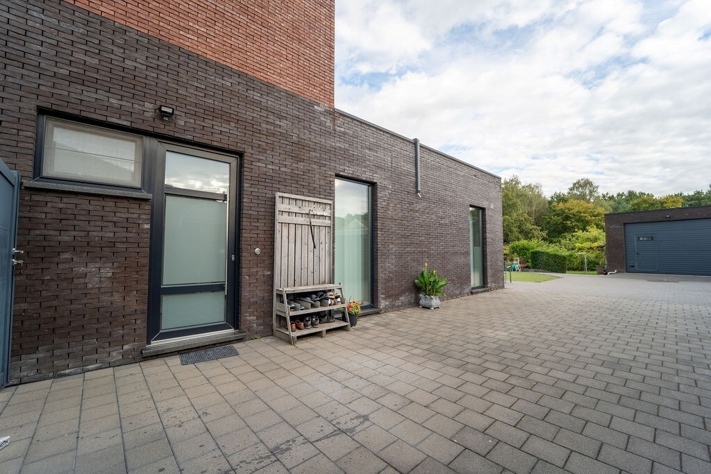 RUIME OPBRENGSTENEIGENDOM MET WOONST TE SPALBEEK (HASSELT) 