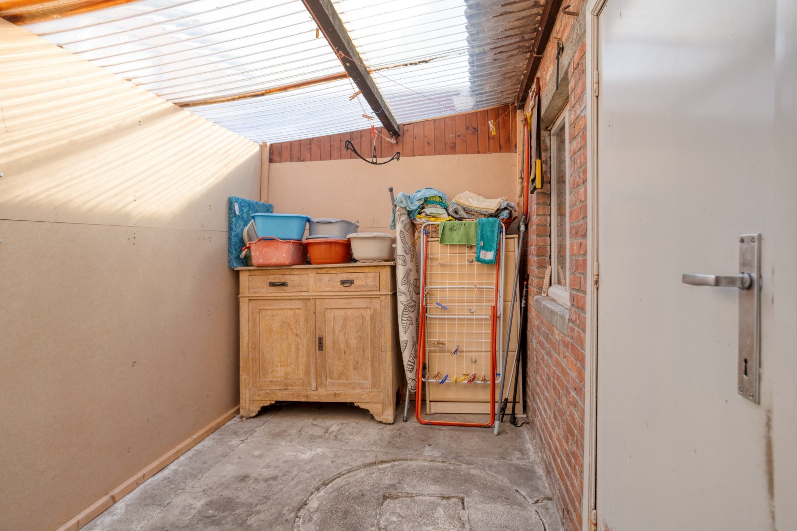 Woning met diepe tuin, garage en vernieuwd geïsoleerd dak, centrum Borgloon 