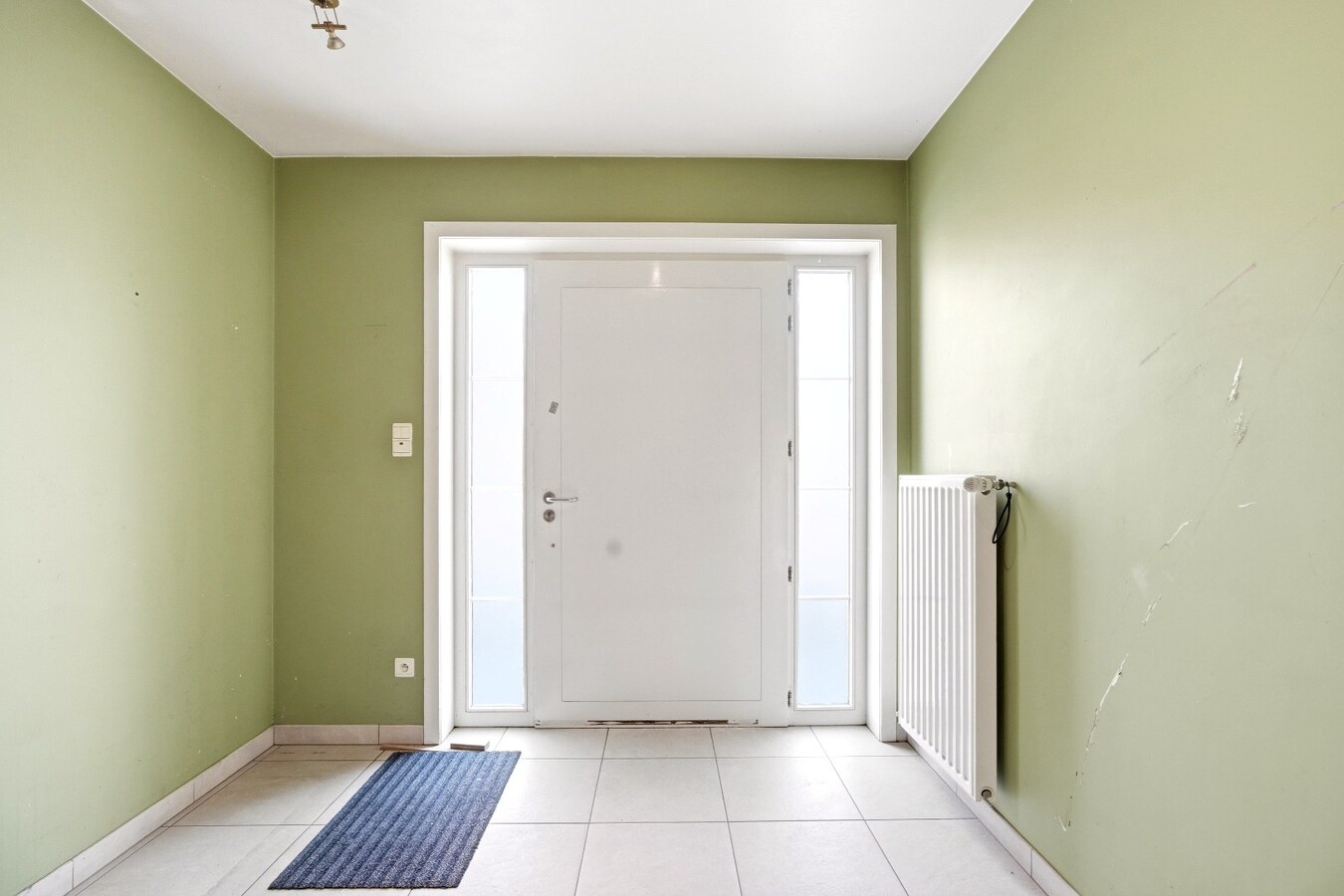 Ruime halfopen woning met 5 slaapkamers te koop in Werken met garage en ruime tuin! 