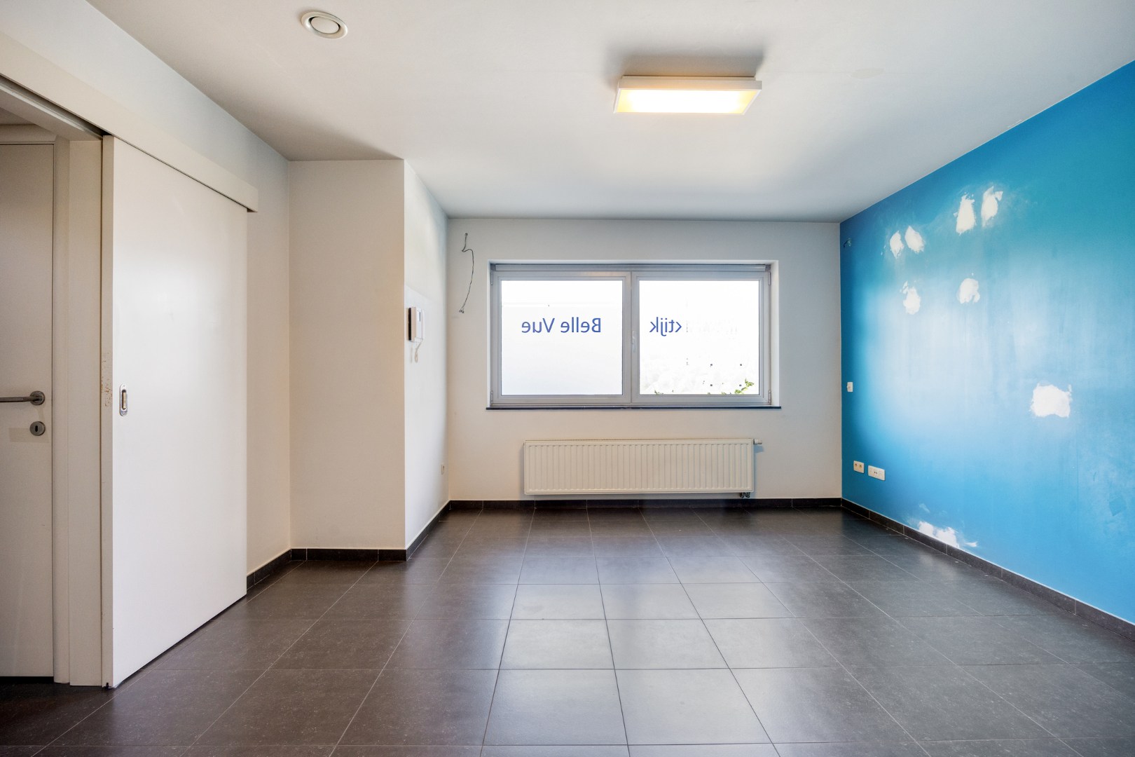 Super gelegen handelspand met buitenruimte in Kessel-Lo 