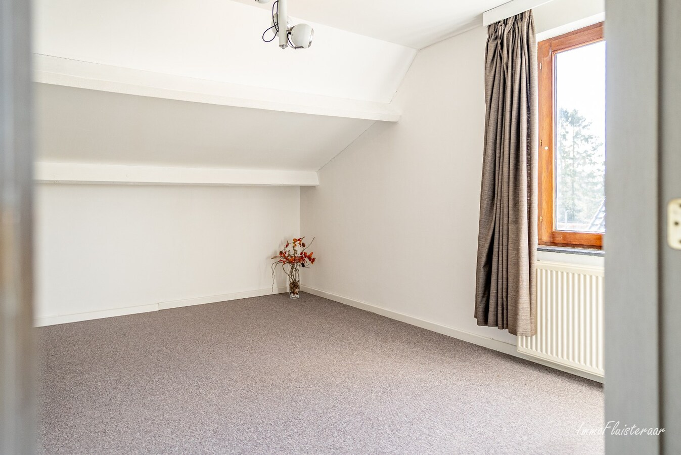 Ruime woning met paardenstallen op ca. 85 are te Kinrooi 