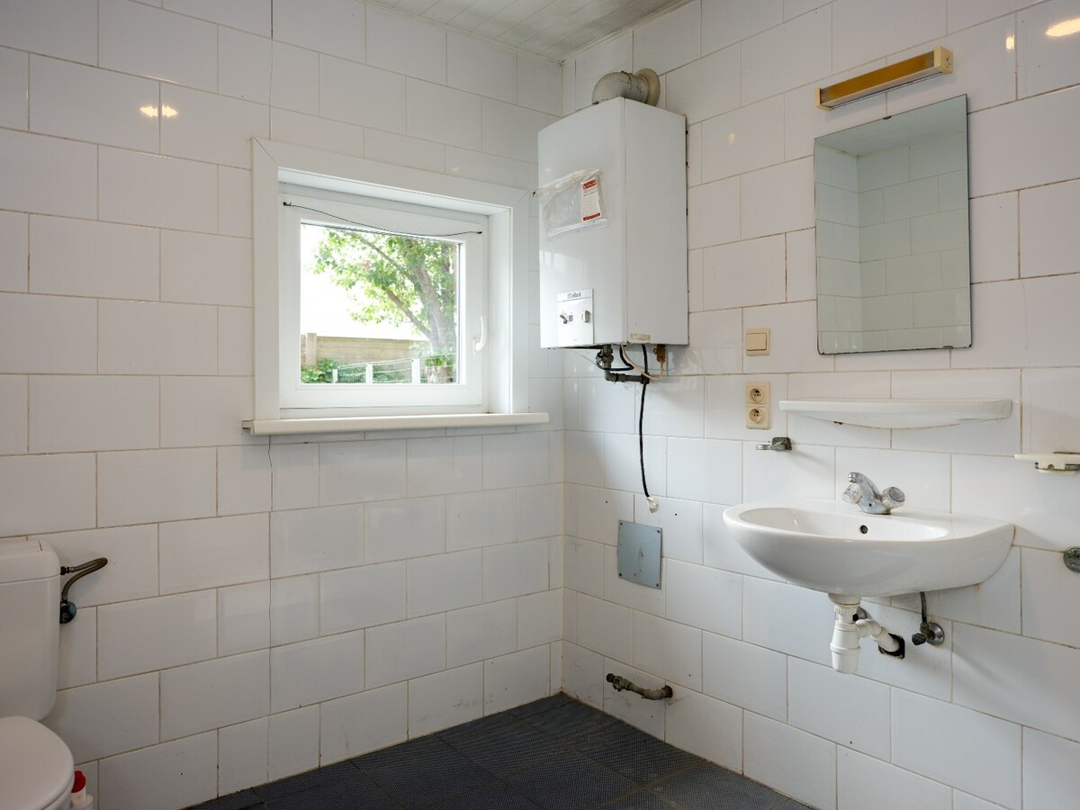 Half-open op te frissen woning met 3 slaapkamers te Gistel 