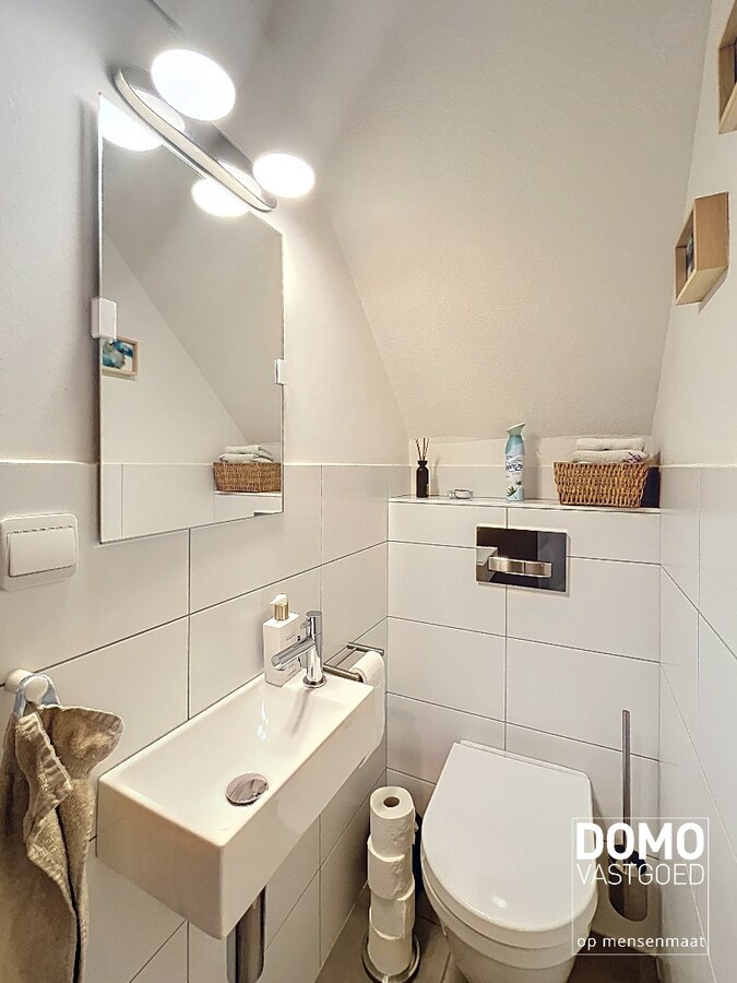 Ruime woning met 4 slaapkamers, groene tuin, terras en inpandige garage 