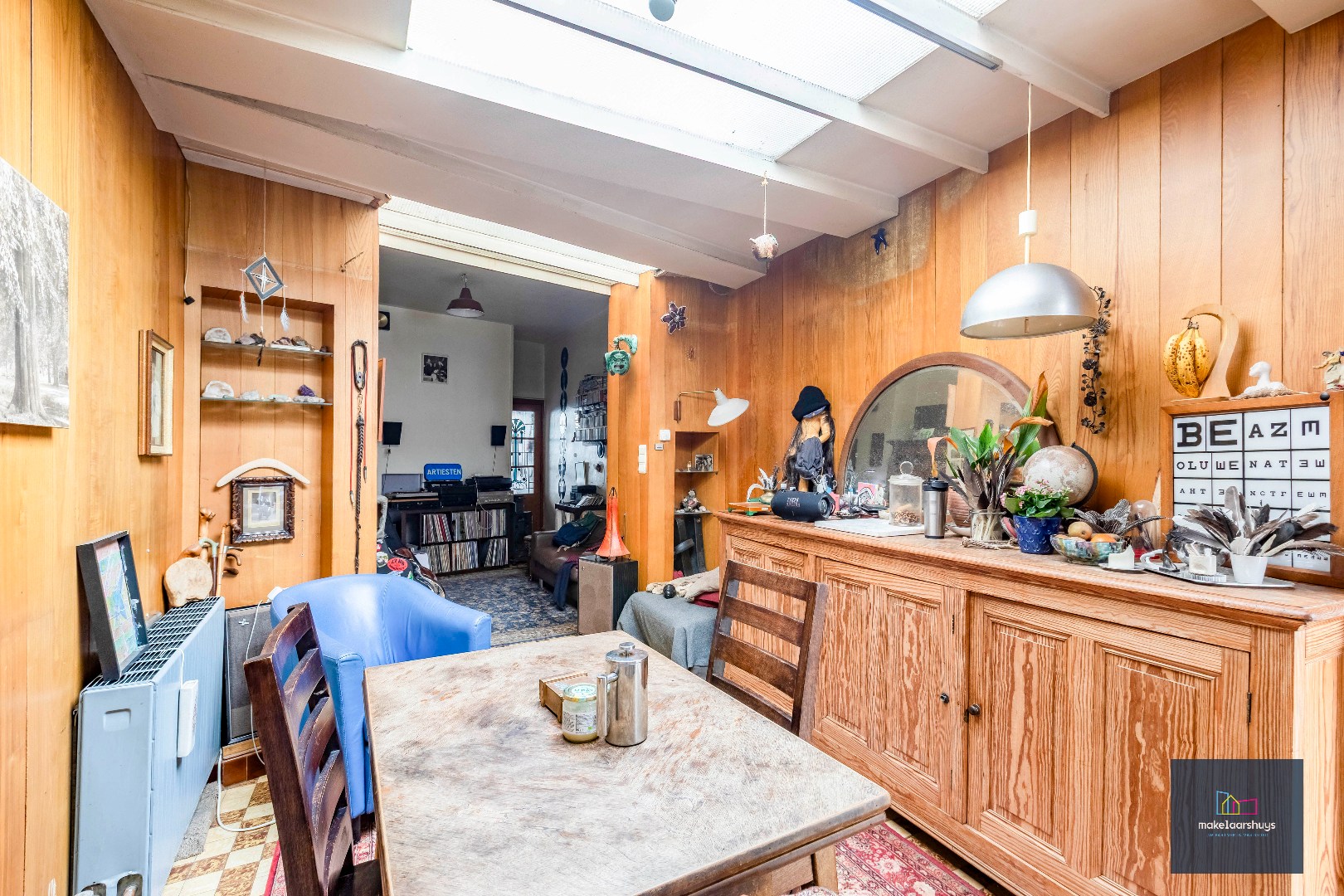 Woning met 3 slaapkamers en verrassende tuin met bijgebouwen 