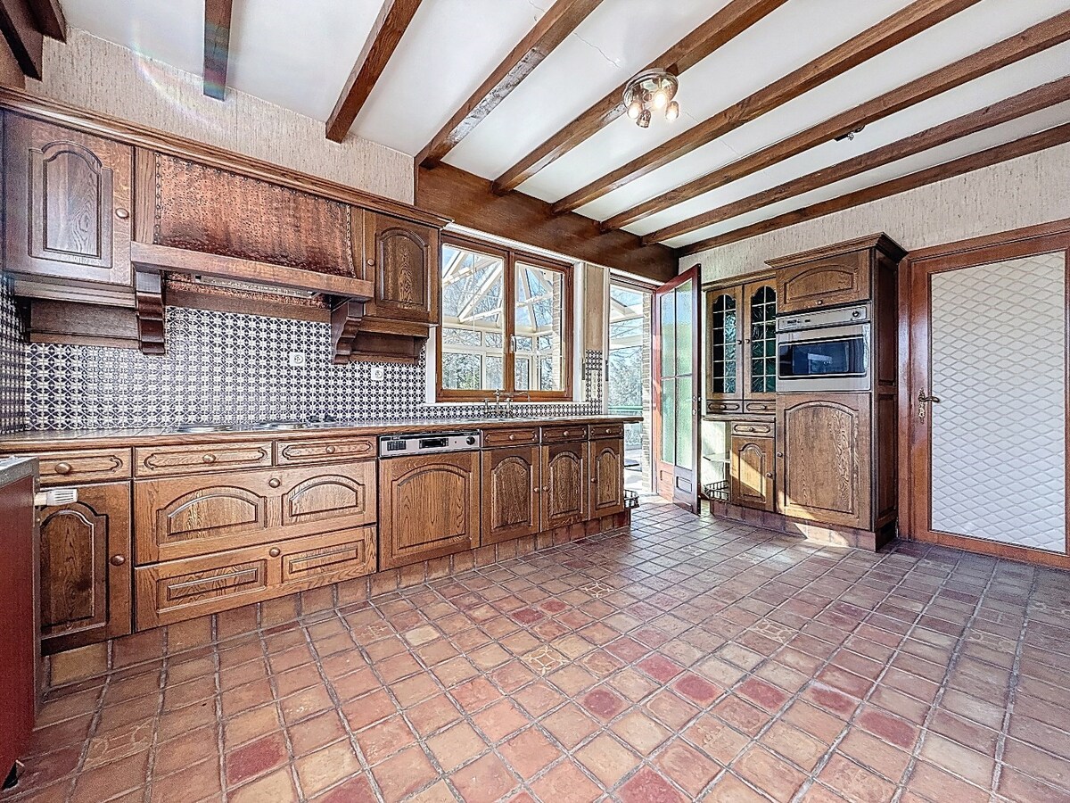 Statige laagbouwvilla met groene achteruit te Scheldewindeke 