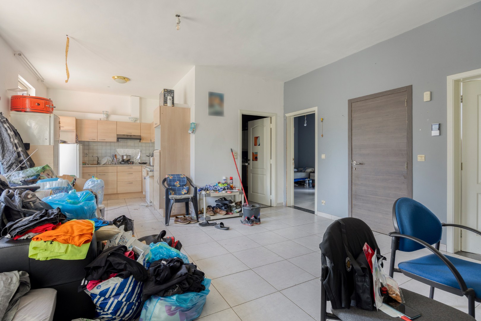 Op te frissen opbrengsteigendom met 3 appartementen en garage in Leopoldsburg 