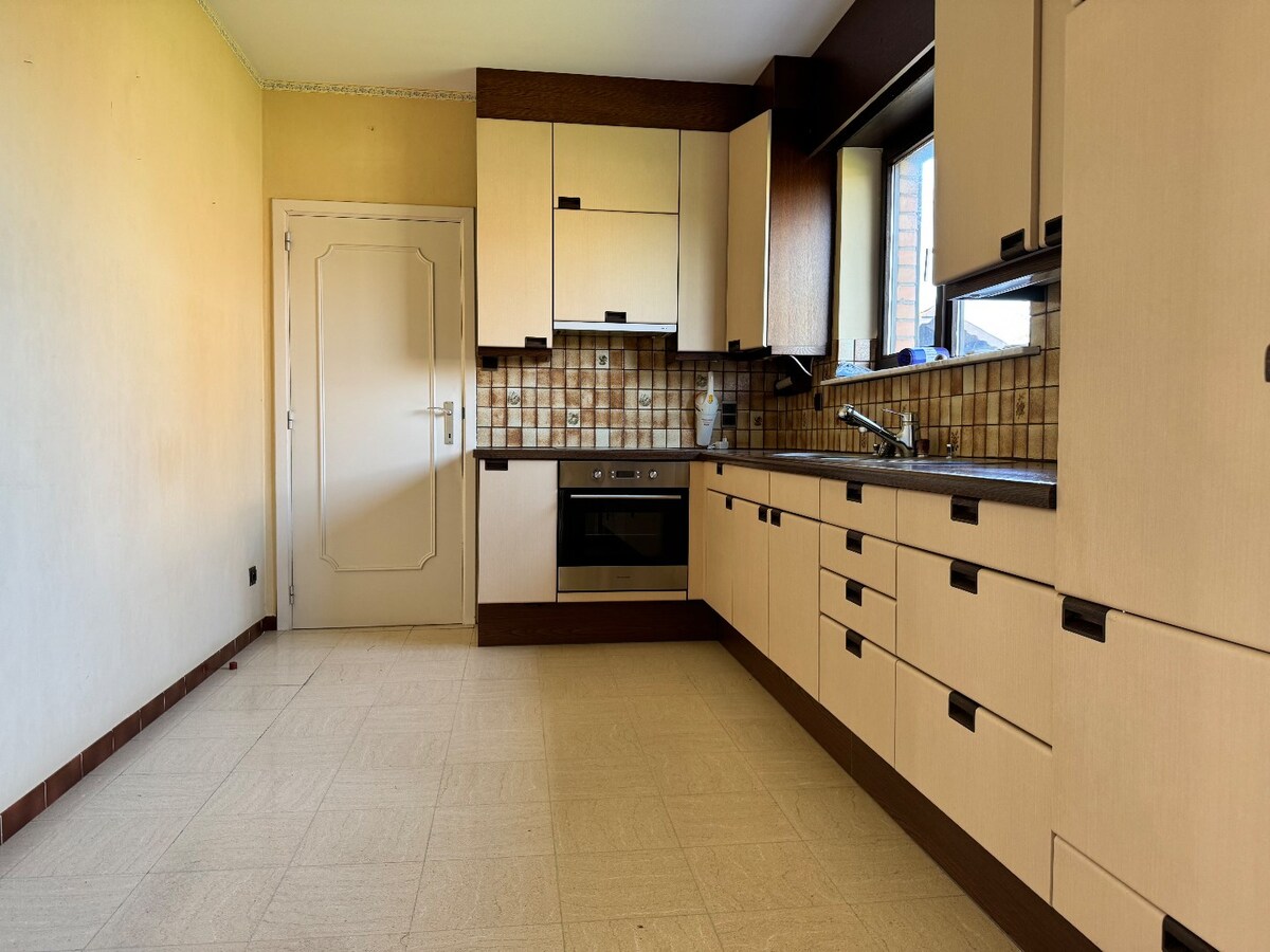 Alleenstaande woning met 4 slaapkamers en garage te Westende 