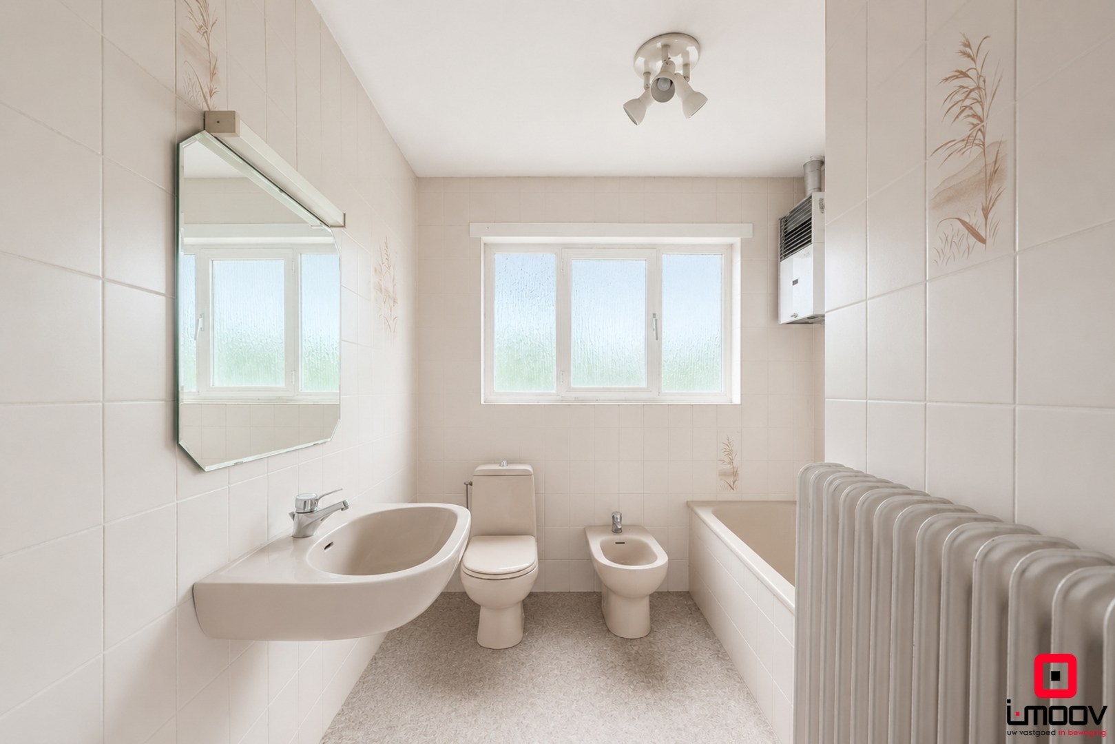 Karaktervolle voormalige apotheekwoning met groene tuin aan het water nabij UZ Gent 