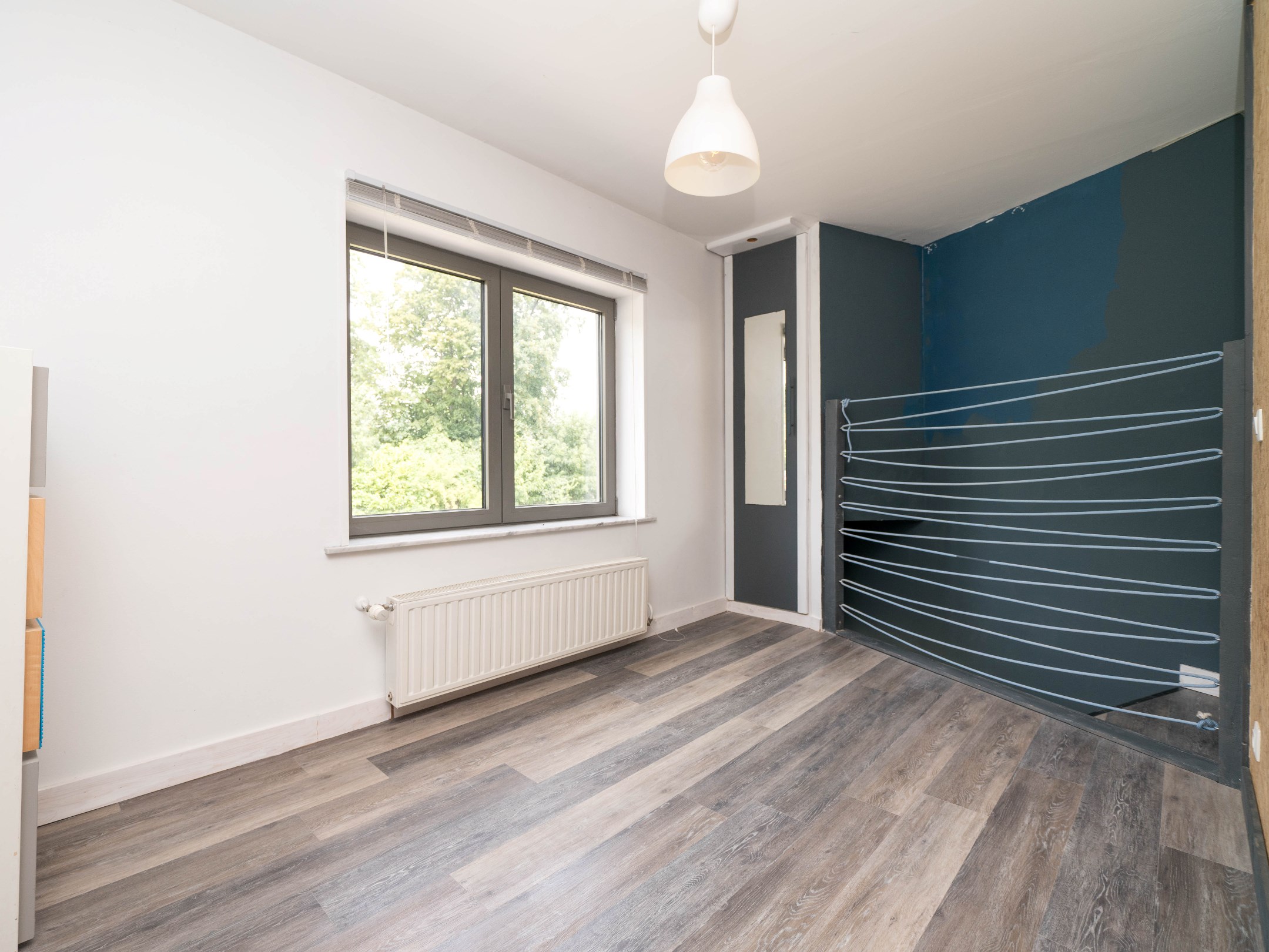 Gerenoveerde woning met 4 kamers, garage en stadstuintje 