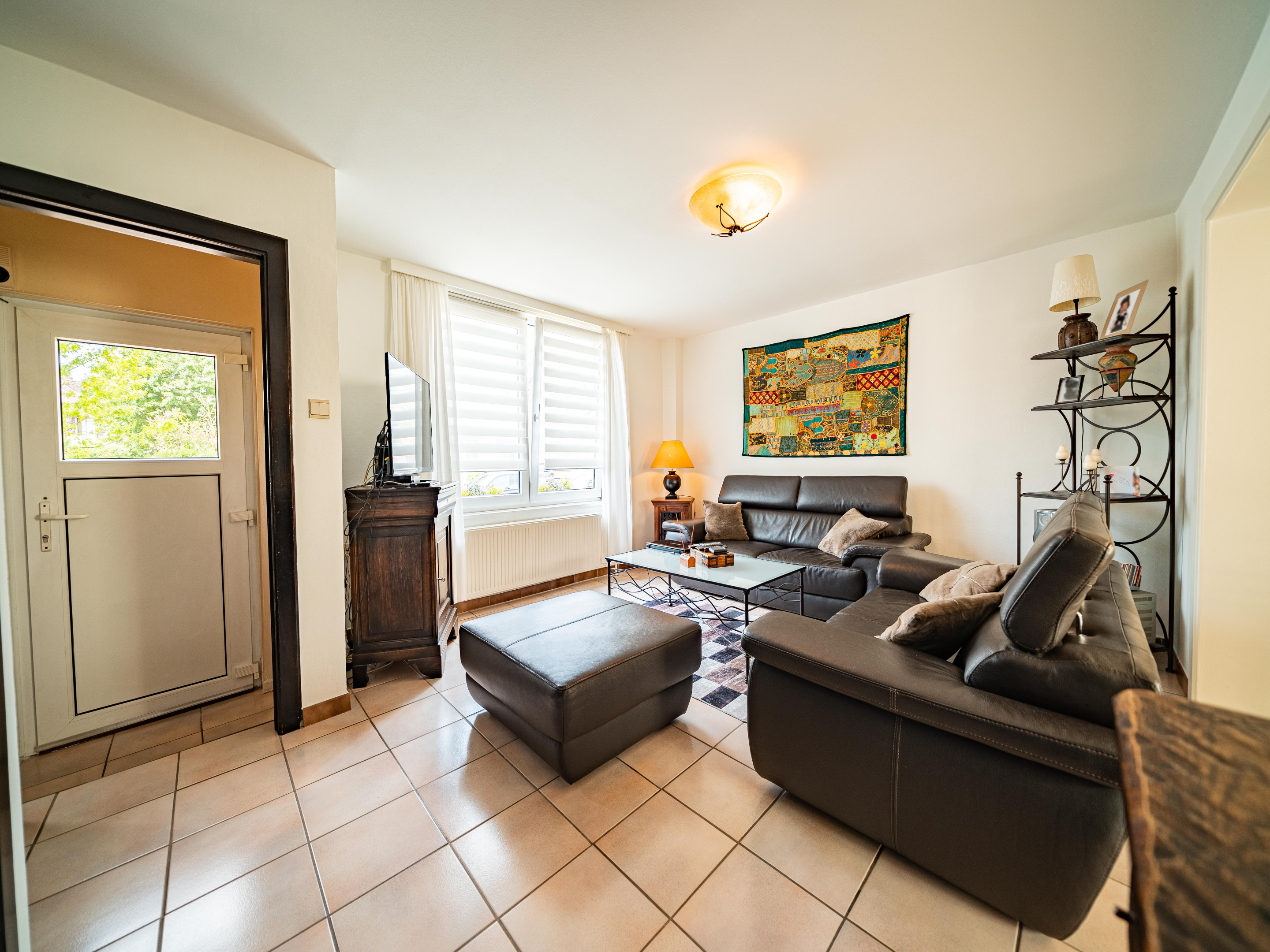 Uitzonderlijk goed onderhouden instapklare woning met 3 slaapkamers en tuin 