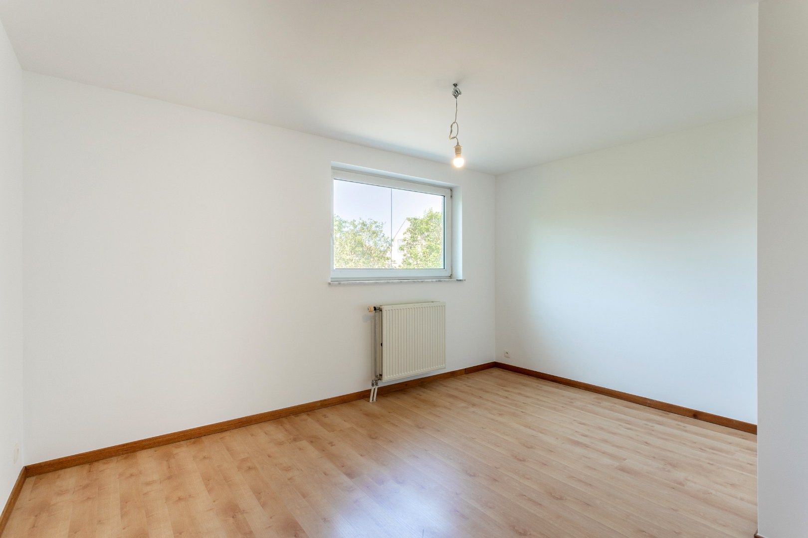 Verzorgde woning met 3 slpk, tuin en garage te Halle 