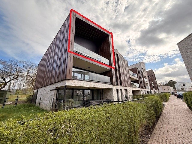 Nieuwbouwappartement met 1 slaapkamer, terras en autostandplaats te Maasmechelen. 