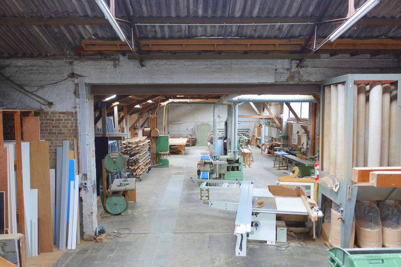 Uitzonderlijke woonst met werkplaats 