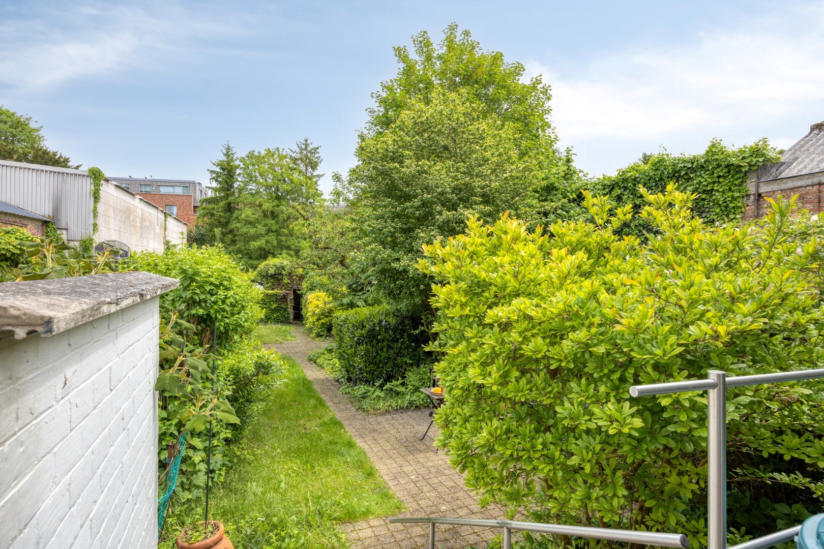Ruime stadswoning met achteruitgang via Janseniusstraat met 4 slaapkamers, garage en tuin te Leuven- EPC 239kwh/m2 