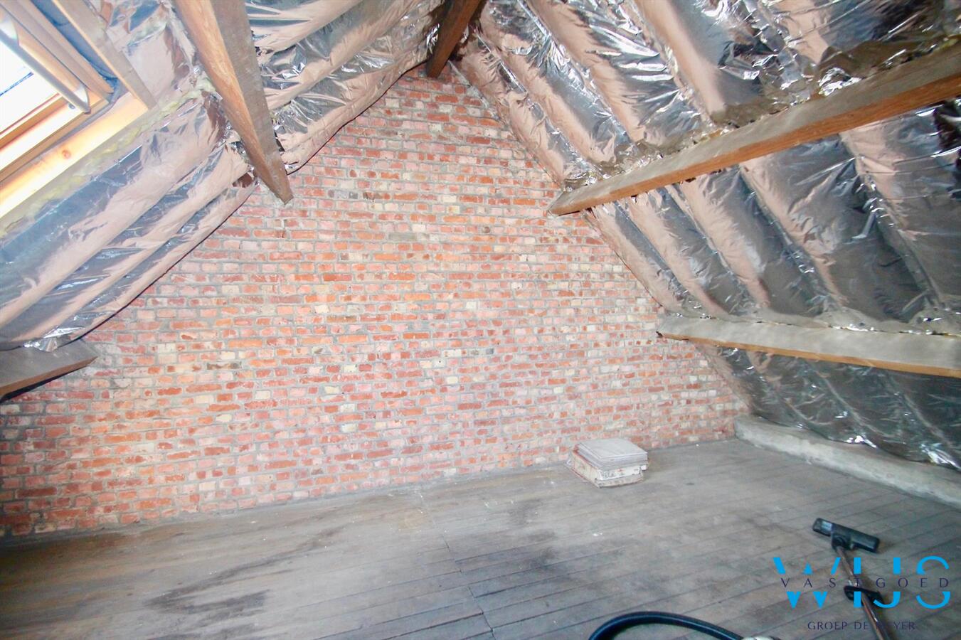 Praktische instapklare rijwoning gelegen in een rustige straat te Rieme! 