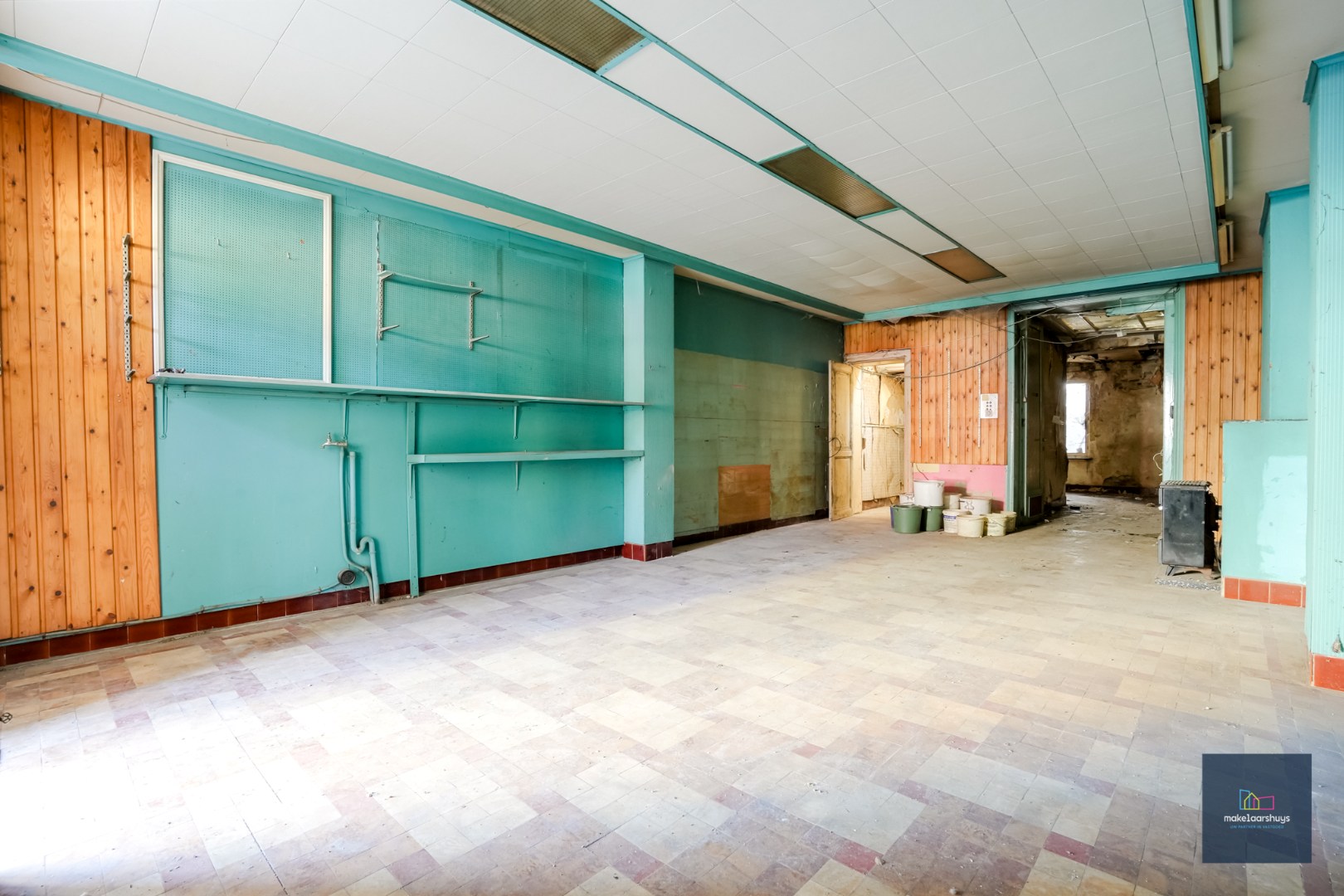 Ruim, te renoveren handelshuis te Gent 