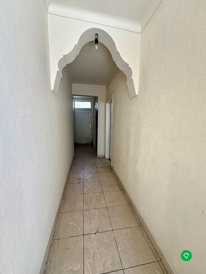 Woning met veel potentieel op een ruim perceel in het centrum van Koekelare 