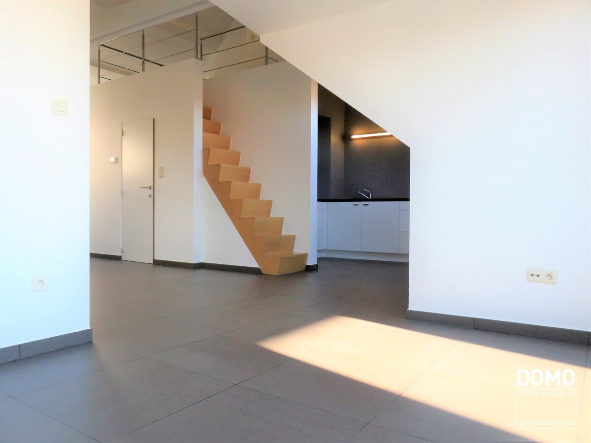 GUNSTIG GELEGEN OPBRENGSTEIGENDOM TE HASSELT 