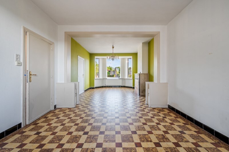 Te renoveren woning met een ruime tuin en zolder – een unieke kans! 