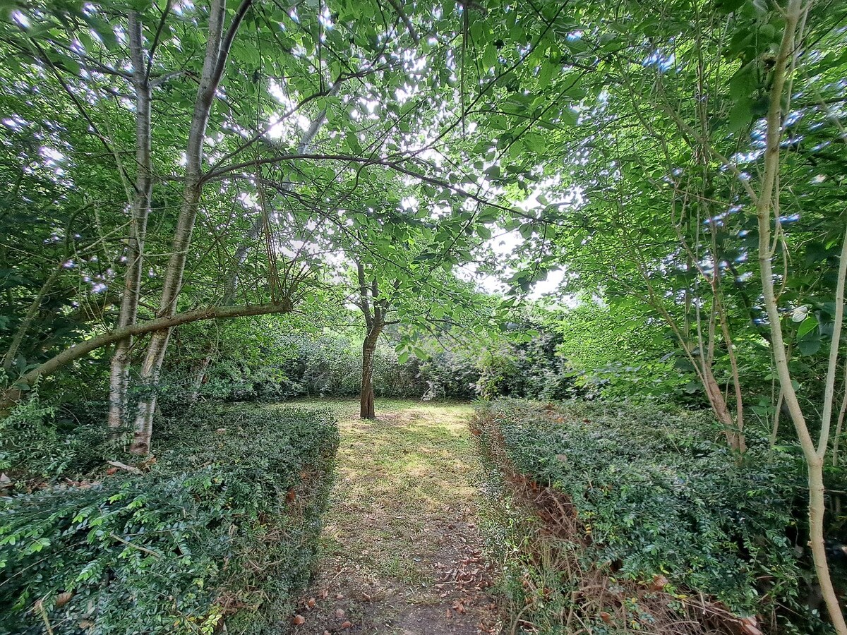 Maison style fermette alliant charme et confort bénéficiant d'un jardin exceptionnel 