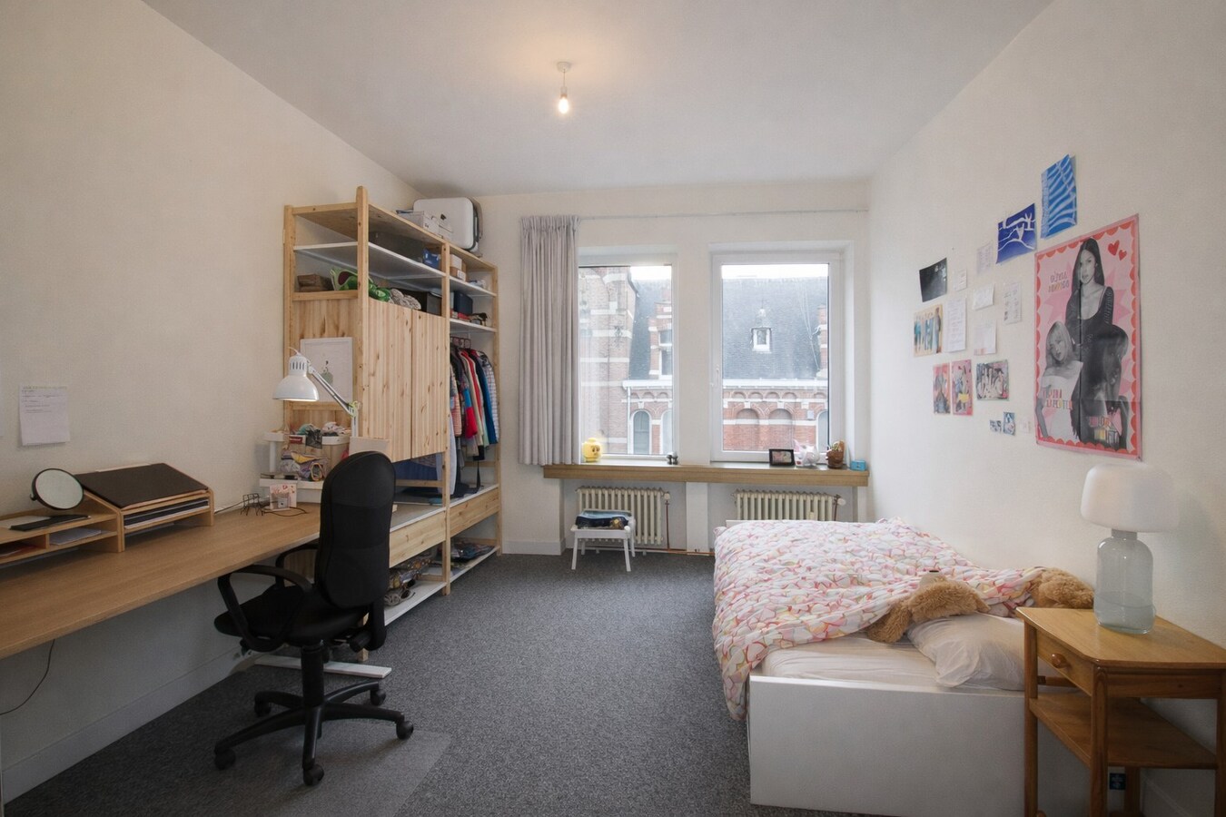 Uitzonderlijk ruim duplex appartement met extra zolderverdieping, tuin en dakterras op topligging in het centrum van Sint-Niklaas! 