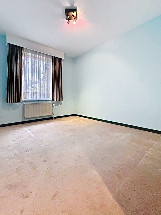 Appartement met 2 slaapkamers en autostandplaats in centrum Leuven 