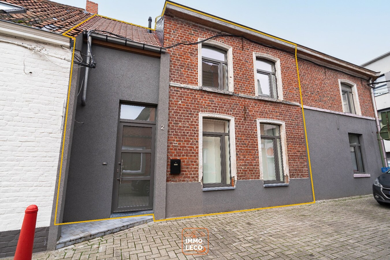 Maison rénovée 2 chambres et grande terrasse/cour, en plein centre de Dottignies ! 