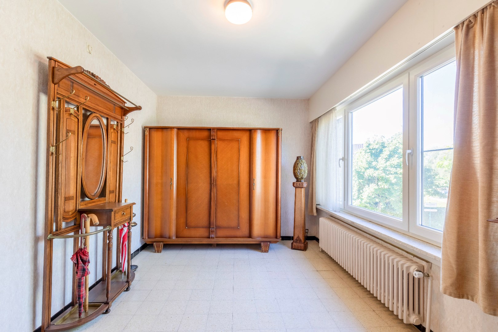 VERKOCHT - Ruime half open bebouwing met garage te Merelbeke 