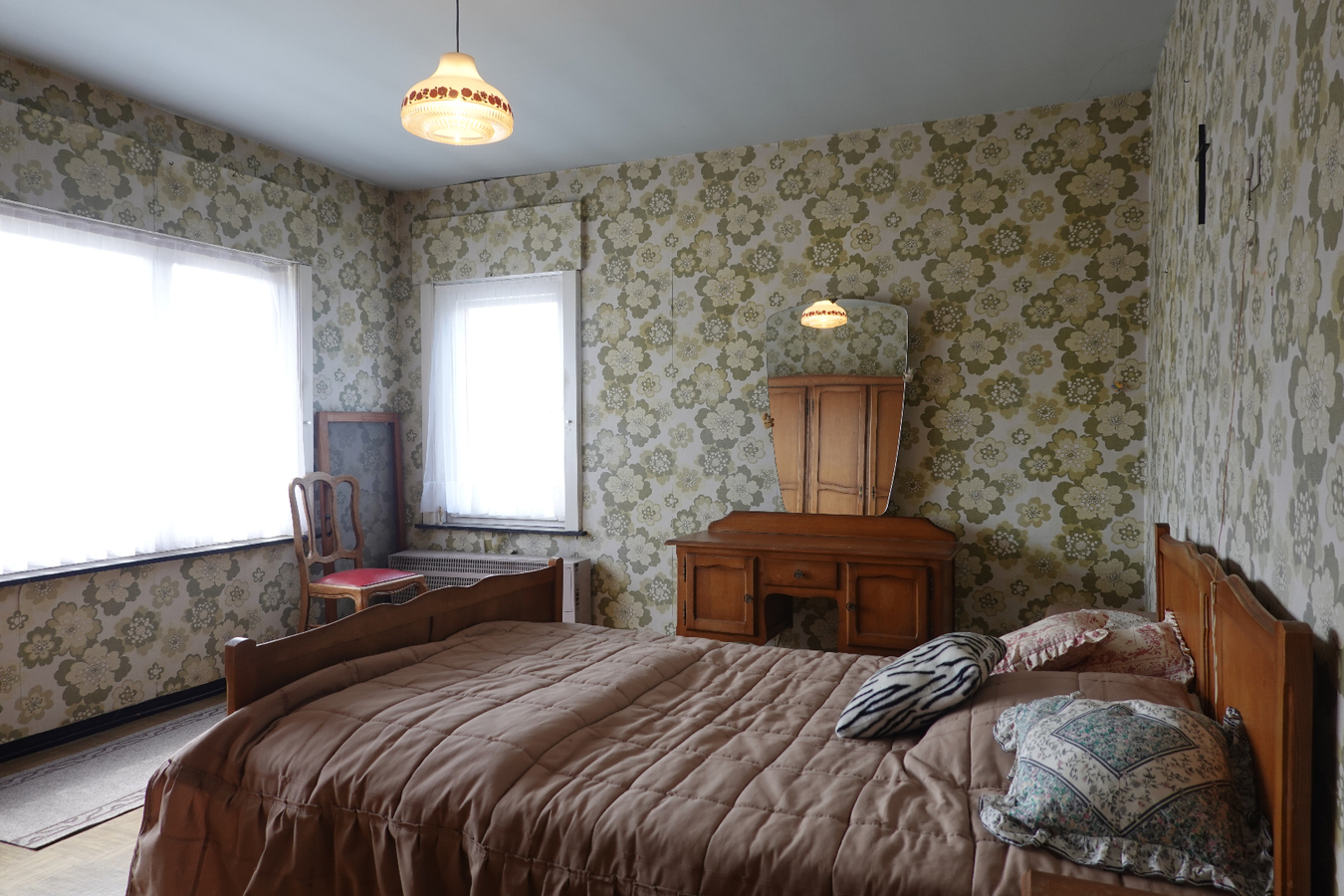 Alleenstaande woning met garage en mooie tuin 