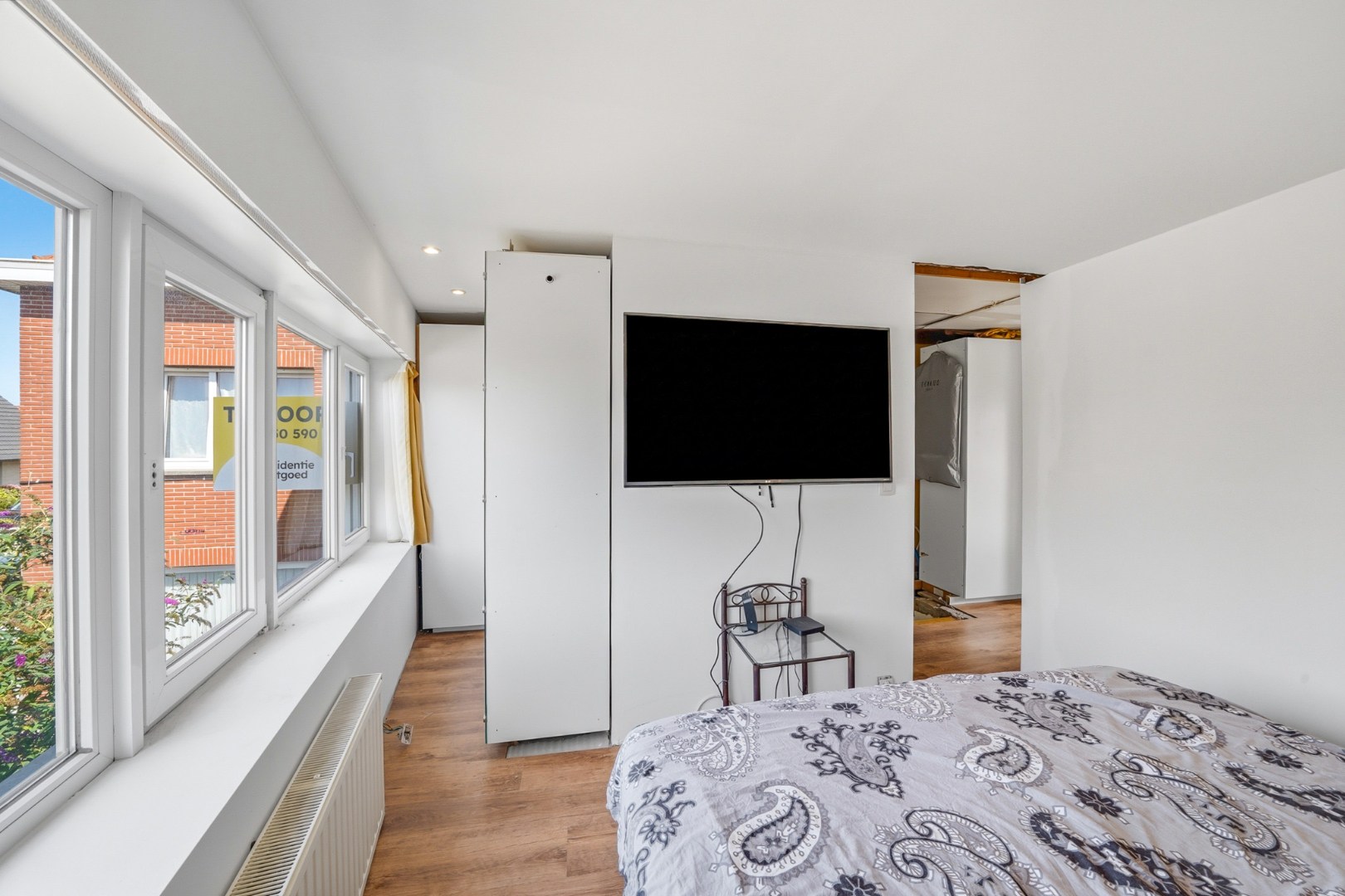 Te renoveren woning met ruime tuin in Bredene 