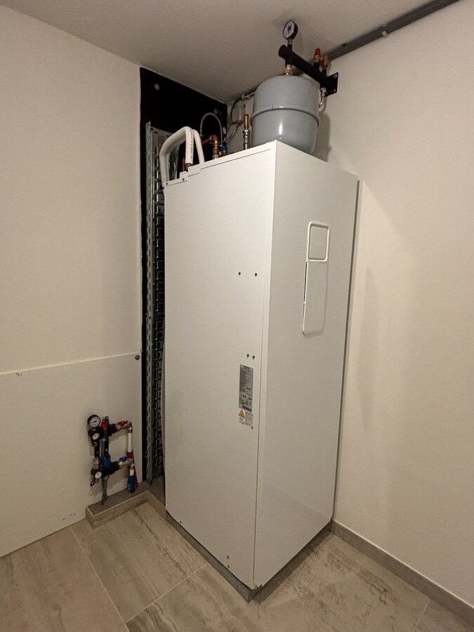 Nieuwbouwwoning met West-tuin in het centrum van Schilde 