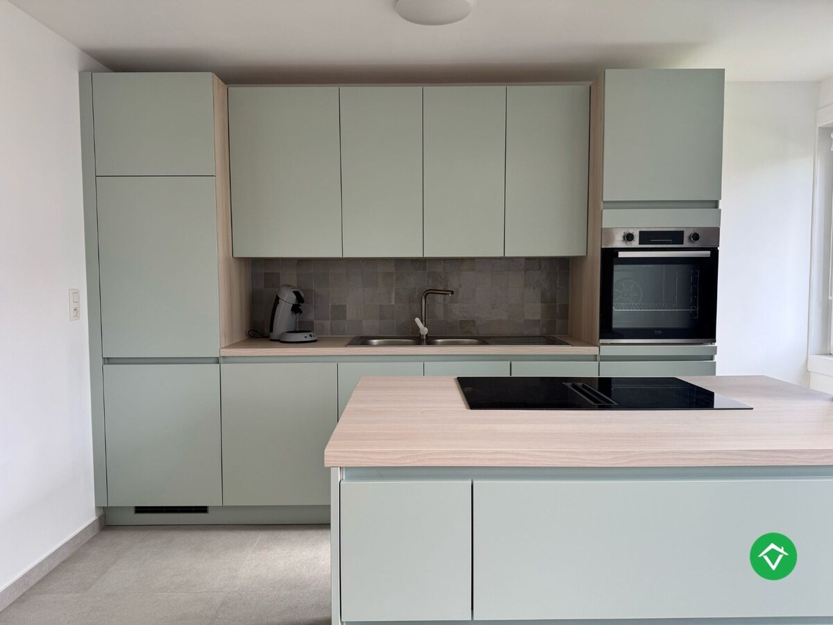 Gerenoveerd 2-slaapkamerappartement met tuin in Klemskerke, De Haan 