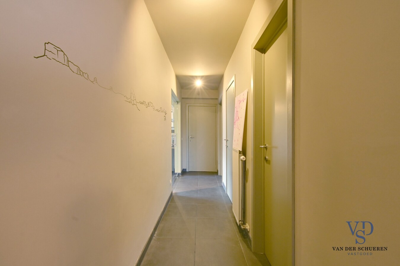 Ruim appartement in hartje Zingem. 